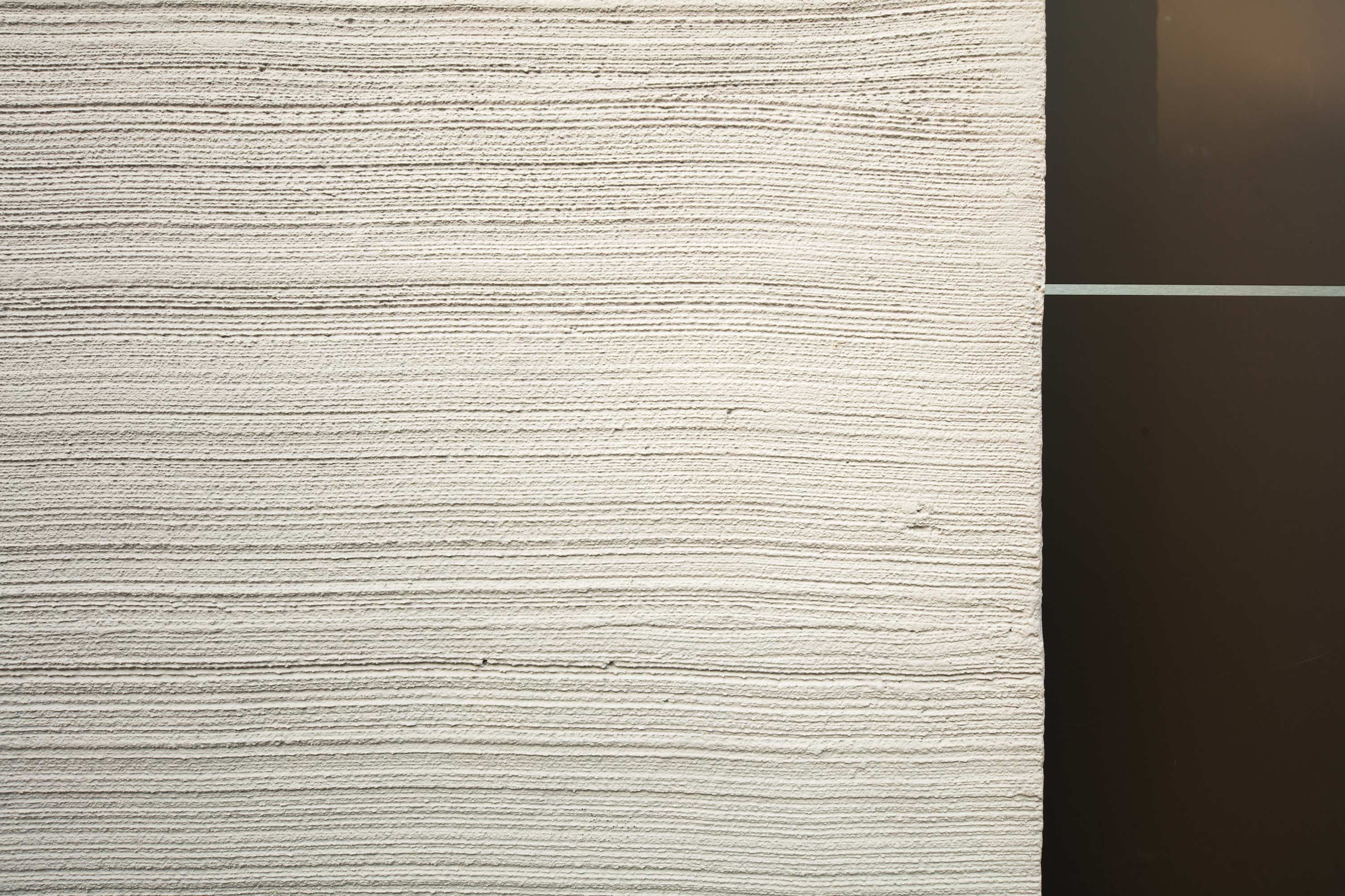 Neue Besenstrichfassade am Haus KLE von der Bermüller+Niemeyer Architekturwerkstatt.